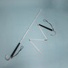 Cane unfolded and partly unfolded on a light background